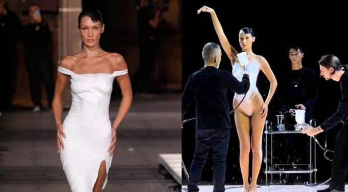 PASA EN REDES: EN EL CIERRE DE LA FASHION WEEK 22 HICIERON UN VESTIDO EN TIEMPO REAL CON ALGODÓN EN SPRAY EN EL CUERPO DE BELLA HADID. ¡MIRÁ!