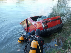 NO ERA EL DE VILMA PALMA: UN AUTO ROJO CAYÓ EN EL LAGO SAN ROQUE.